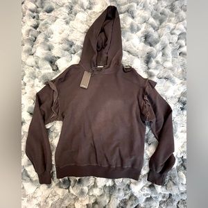 Super soft, NWT, lightweight, cute pullover with ruffles on shoulders.